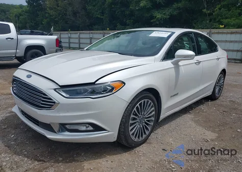 2017 Ford Fusion Hybrid Titanium z USA, uszkodzony, nr VIN 3FA6P0RU1HR203797